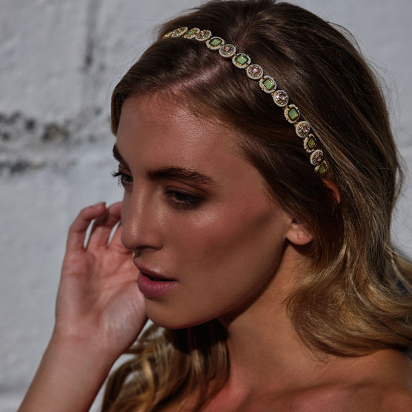 Handcrafted Crystal-Studded Hairband – A chic crystal-studded hairband designed to add glamour and shine to any ensemble.

