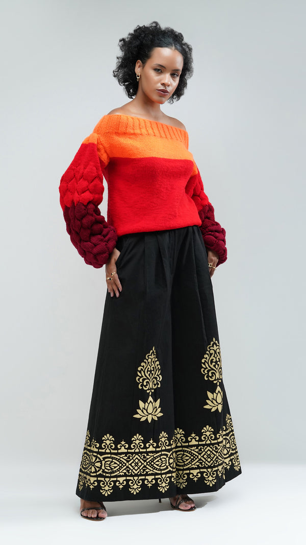 Nesavaali Screen Printed Black Wide Leg Trousers by Nesavaali, showcasing their elegant design.