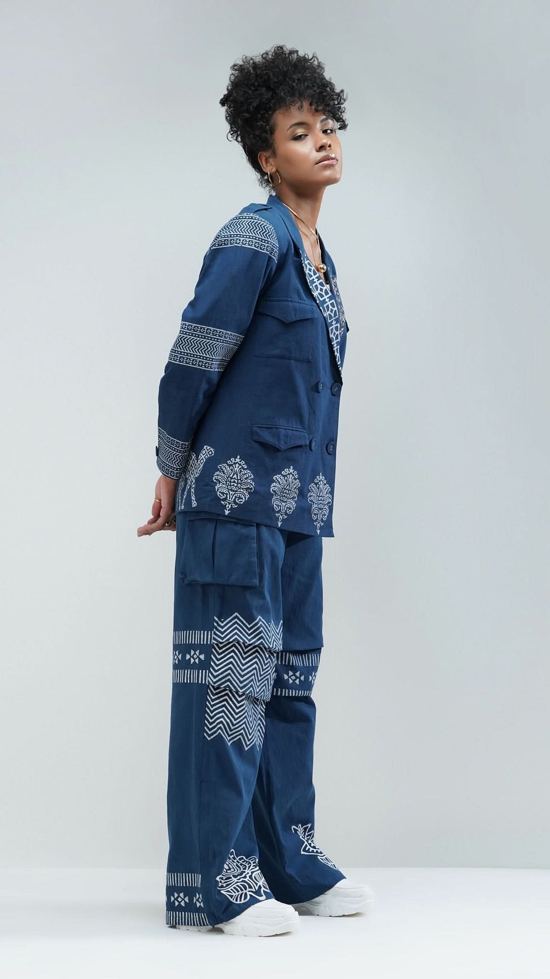Nesavaali London Navy Relaxed Fit Printed Blazer, emphasizing its chic silhouette.