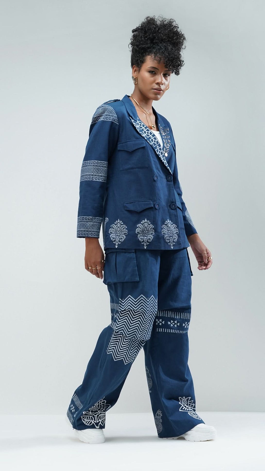 Nesavaali Navy Relaxed Fit Printed Blazer by Nesavaali, showcasing its elegant design.