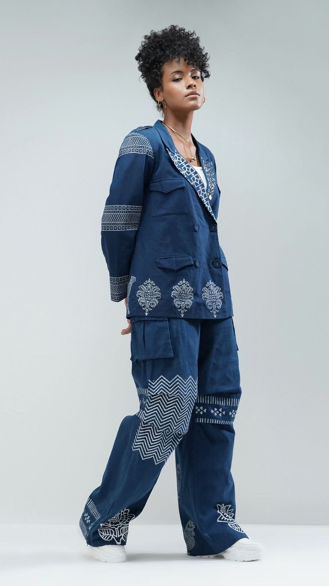 Nesavaali Front full view of the Navy Printed Wide Leg Cargo Trousers by Nesavaali, showcasing their elegant design.