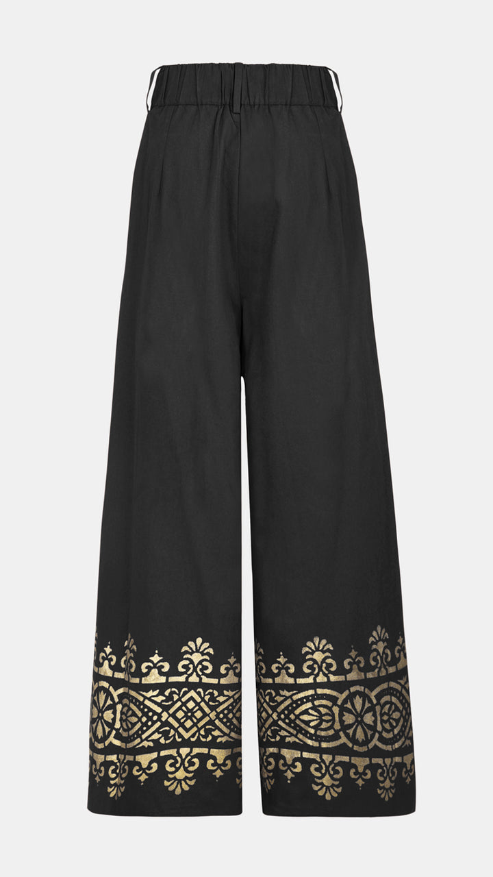 Women's Luxury Screen Printed Black Wide Leg Trousers, perfect for sustainable fashion enthusiasts.