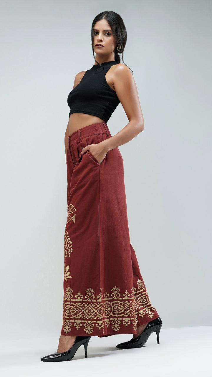 Women's Designer Metallic Printed Wide Leg Trousers, emphasizing the stylish design and gold details.