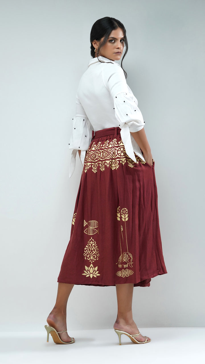 Nesavaali's Artisanal Rust Metallic Gold Midi Skirt, ideal for both casual and formal occasions.