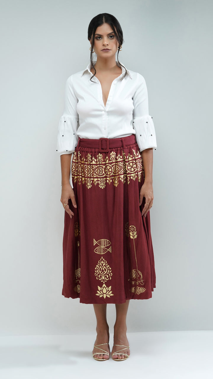 Women's designer luxury Artisanal Rust Metallic Gold Midi Skirt by Nesavaali, showcasing its stylish design.