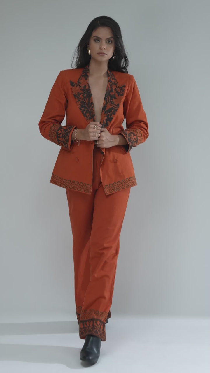 Rust Oversized Double-Breasted Blazer, highlighting its luxurious cotton craftsmanship