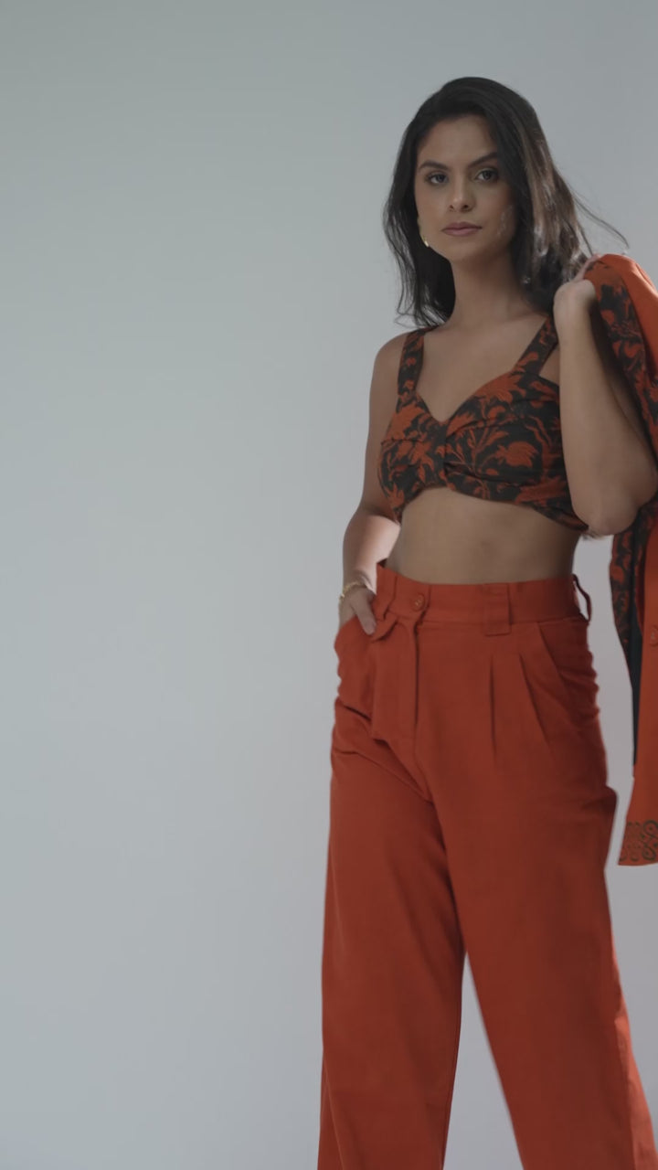 Reel view of the Distressed Artisanal Printed Cotton Cropped Top, highlighting its unique design and fabric.